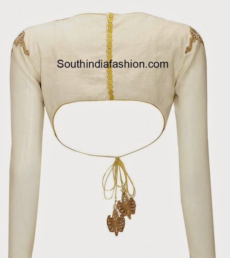 Boat neck full sleeves blouse featuring zari embroidery over the shoulders and a small key hole detail on one side. It has contrast show buttons and tassels on the back. Related PostsMirror Work Full Sleeves BlouseBoat neck Embroidered BlouseBlack Sequins Boat Neck BlouseBoat Neck Gold Brocade Blouse Full Sleeve Blouse Designs Back Side, Blouse Neck Patterns, Lehenga Blouses, Blouse Boat Neck, Full Sleeves Blouse, Blouses Pattern, Indian Blouses, Sari Blouses, Blouse With Buttons