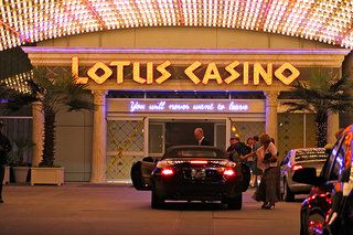 The Lotus Hotel and Casino is located in Las Vegas, Nevada, USA. While inside it, it seems like time never passes and nobody wants to leave. It was created by the Lotus-eaters so that anyone entering would never want to leave because of all the addictive games, food (in the case of the movie), and other activities, combined with the unlimited money on plastic cards. The hotel causes those inside never to age, while time goes on at a seemingly accelerated rate outside. Lotus Casino, Sea Of Monsters, The Lightning Thief, Hotel California, Annabeth Chase, The Lotus, Camp Half Blood, Heroes Of Olympus, Percy Jackson And The Olympians