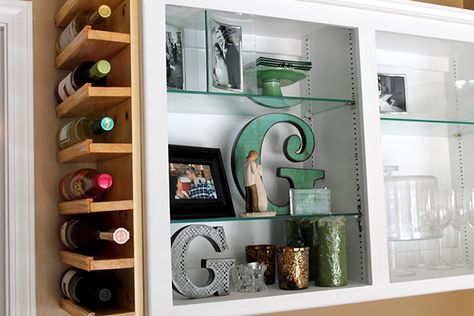 Pursuit of Healthfulness, uses a bit of lumber and trim to create an awesome built-in wine rack in the narrow space on the side of a cabinet. Not only does this wine rack take advantage of some small, previously unused space in their home, but it also is the perfect way to bring the Pinot supply into their living room bar area. Living Room Bar Area, Homemade Wine Rack, Kitchen Cabinet Wine Rack, Wine Storage Diy, Built In Wine Rack, Wine Rack Cabinet, Wine Shelves, Living Room Bar, Diy Wine Rack