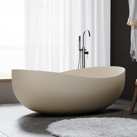 A foundational piece for any bathroom, this fabulous tub is fabricated from an exquisite merger of concrete, sand, and water. Truly an artistic marvel, the bathtub both features a silk-like smoothness and a simple yet refined shape.- Tub Materials: Cement, Water, and Sand- Beige Finish- Smooth Texture Throughout- Overall Dimensions: 62.99" L x 37.99" W x 23.03" H( 1600mmL x 965mmW x 585mmH )- With Drain, No Overflow- Variations in Color, Shade, and Markings Make Each Tub Unique- Item Water and H Relaxing Bathroom, Zen Bathroom, Ship Decor, Beige Bathroom, Precast Concrete, Soaking Bathtubs, Bathroom Wall Sconces, Bathroom Wall Lights, Soaking Tub