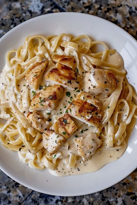 Chicken Alfredo is a delicious and nutritious choice for any mealtime! 🍝🍗 Made with tender chicken and creamy Alfredo sauce, this dish is a delightful blend of rich flavors and smooth texture. Quick to prepare and bursting with savory goodness, Chicken Alfredo is perfect for a refreshing dinner or special treat. Indulge in this vibrant twist on a classic favorite today! 😋🌿 #ChickenAlfredo #SavoryMeals #HealthyEating #RichFlavors Drinks And Dinner Aesthetic, Pasta Alfredo With Chicken, Chicken Alfredo Pasta Aesthetic, Chicken Alrefredo, Fettucine Alfredo With Chicken, Good Meals Dinners, Chicken Alfredo Aesthetic, Homecooked Meals Aesthetic, Chicken Dinner Aesthetic