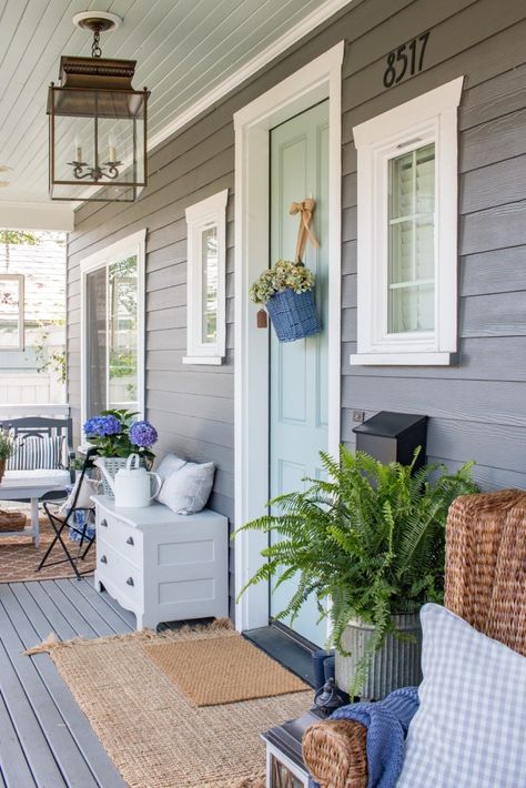 Tour a front porch decorated for summer. Budget friendly and cozy spaces for lounging and relaxing using grays, blues and purple. Front Porch Refresh, Porch Refresh, Veranda Design, Porch Kits, Summer Porch Decor, Blue Front Door, Building A Porch, Seattle Homes, Farmhouse Front Porches