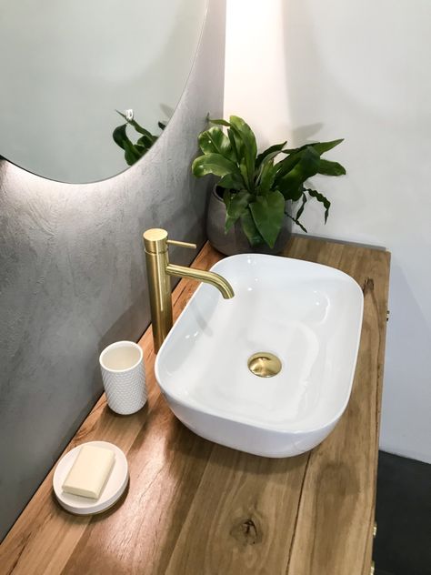 Big in bathrooms: bold colour, brass, concrete, mirrors - The Interiors Addict Tap For Bathroom, Brushed Brass Bathroom Ideas, Bathroom Worktop Ideas, Brass Taps Bathroom, Bathroom Schemes, Bathroom Worktop, Highgrove Bathrooms, Oblong Mirror, Ensuite Renovation