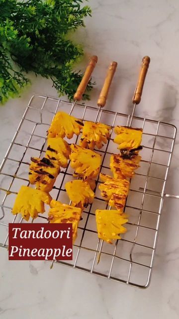 Samiksha | Foodie Chef on Instagram: "Tandoori Pineapple is so tangy & so juicy! It's a must try recipe! I had this in a Shadi, for which I was hesitant at first. But then I liked it instantly. So we are keeping it simple, you can even add veggies to make it like a tikka. This can also be air fried but I love flame grilling my tikkas for that charred look & smoky flavour! Follow @eat.greet.repeat for such mazedaar recipes! Ingredients - 4 thick slices of fresh pineapple 1/4 cup hung curd Salt Pineapple Recipes, Fresh Pineapple, Mustard Oil, Keeping It Simple, Tangier, Ganesh Chaturthi, Garam Masala, Recipe Of The Day, Keep It Simple