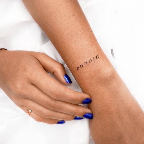 Text Tattoo Wrist, Word Tattoo Wrist, Writing Wrist Tattoo, Wrist Word Tattoos, Wrist Font Tattoo, Eunoia Tattoo, Eunoia Tattoo Font, Ein Wort Tattoo, Healthcare Tattoo