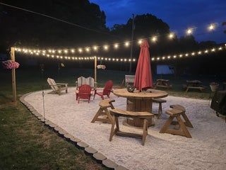 Laying Concrete, Gravel Patio Ideas, Wooden Spool Projects, Pea Gravel Patio, Outdoor Patio Area, Gravel Landscaping, Outdoor Patio Diy, Gravel Patio, Fire Wood