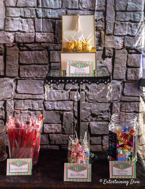 Honey dukes candy bar is just one of these great Harry Potter party ideas! Printable signs and fonts included. #entertainingdiva #harrypotter #harrypotterparty #halloween #birthdayparty #partyideas #parties Honey Dukes Candy Bar, Honey Dukes Candy, Hogwarts Banner, Halloween Party Ideas For Adults, Harry Potter Table, Harry Potter Party Ideas, Honeydukes Candy, Honey Dukes, Harry Potter Candy