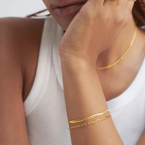 Discover timeless elegance with our Core Collection ✨ Elevate your style with these three must-have pieces: Snake Bracelet, Paperclip Bracelet and Ariel Necklace. #LoveLettersoxo #JewelryEssentials #TimelessElegance Bracelet Aesthetic Gold, Permanent Bracelet, Ariel Necklace, Jewelry Shoot, Bracelet Aesthetic, Wrist Stack, Gold Bracelets Stacked, Wrist Stacks, Gold Snake Chain