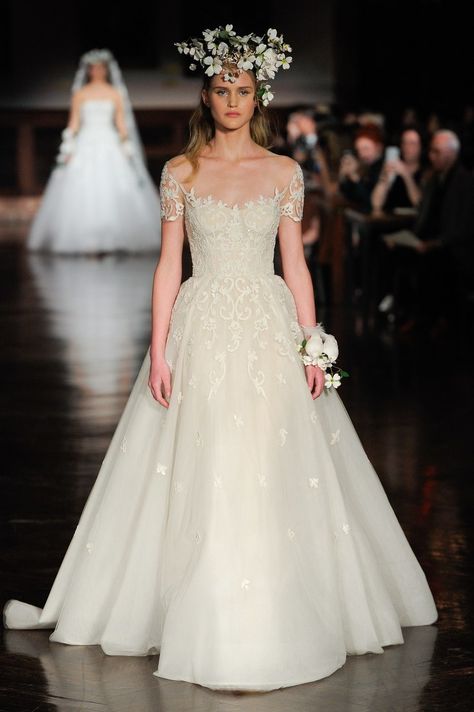 "The Promised One" voluminous wedding dress with short illusion sleeves, [Reem Acra](https://www.brides.com/photo/wedding-dresses/designer/reem-acra) Reem Acra Wedding Dress, Reem Acra Bridal, Chic Vintage Brides, Western Wedding Dresses, Wedding Dress Collection, Wedding Dresses Ball Gown, Reem Acra, Dresses Ball Gown, Bridal Fashion Week