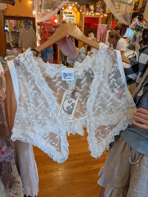 A lace vest. Lace Vest Outfit, Cute Lace Tops, White Lace Top Outfit, Lace Cardigan Outfit, Lace Top Outfit White, Lace Shirt Outfit, White Lace Vest, Vest Outfits Aesthetic, Lace Top Outfit