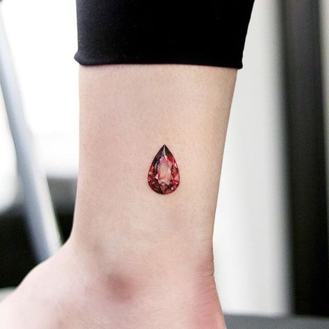 Beautiful ruby tattoo | Artist: @tattooist_uzi Ruby Tattoo, Gem Tattoo, Ankle Tattoos For Women, Anklet Tattoos, Gold Tattoo, Hip Tattoos Women, Kawaii Tattoo, Desenho Tattoo, Time Tattoos