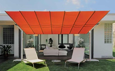 Flexy waterproof shade, £4,816, can be tilted and retracted; 3m wide, 4.28m long;   (02392 410045; encompassco.com). Commercial Umbrellas, Offset Umbrella, Pergola Design, Concrete Pavers, Sunbrella Fabric, Chaise Lounge Chair, Piece Of Cakes, Patio Table, Modular Design