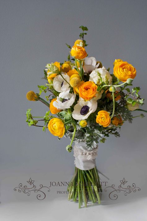 Spring like Bridal Bouquet, Yellow rununculas, white anemones, cream lisianthus, white and yellow wedding theme, hand picked, understated look. Yellow Orange Wedding Bouquet, Yellow And White Flower Arrangements, Cream Lisianthus, Orange Bridal Flowers, Bridal Bouquet Yellow, White And Yellow Wedding, Yellow Bridal Bouquets, Orange Wedding Bouquet, White Anemones