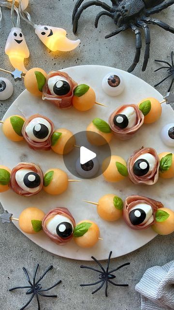 Sine Siemkowicz on Instagram: "Mozzarella Eyeball Skewers.👀

Deliciously spooky skewers for your Halloween gatherings with bocconcini, prosciutto, olives, and cantaloupe. Top with sea salt, olive oil and balsamic glaze. Yum!

#halloweenfood #halloweenideas #spookyszn #halloweenpartyfood #spookyfood #food52" Eyeball Salad, Mozzarella Eyeballs, Halloween 23, Spooky Food, Halloween Eyeballs, Fall Food, Halloween Food For Party, Balsamic Glaze, Holiday Food