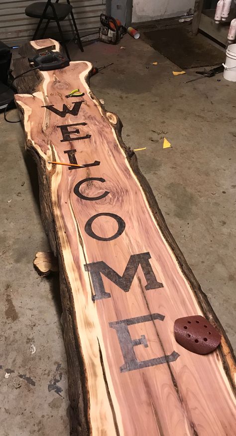 Large cedar plank welcome sign with acrylic finish. Crafts With Cedar Wood, Cedar Ideas Projects, Projects With Cedar Wood, Cedar Board Projects, Live Edge Welcome Sign, Cypress Wood Projects, Wood Burn Signs, Gifts Made Out Of Wood, Cedar Log Projects