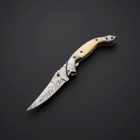 DAMASCUS LINER LOCK FOLDING KNIFE Product Details Materials Damascus Steel Measurements 5.50"L x 2.25"W x 1.25"H — Open Length: 8.00" — Blade Length: 3.25" — Closed Length: 4.75" — Blade Hardness: 56-58 HRC — Blade Material: 1095 & 15N20 Steel — Folding Liner Lock Knife — Damascus Steel Bolster — Smooth Bone Handle With Mosaic Pins — File Worked Brass Liners & Steel Lever — Includes Genuine Leather Sheath With Belt Loop #knife #knives #edc #knifeporn #knifelife #everydaycarry #handmade #kn... Knife Skill, Forged Knife, Damascus Steel Knife, Folding Pocket Knife, Folding Knife, Hunting Knife, Steel Handle, Leather Sheath, Damascus Steel