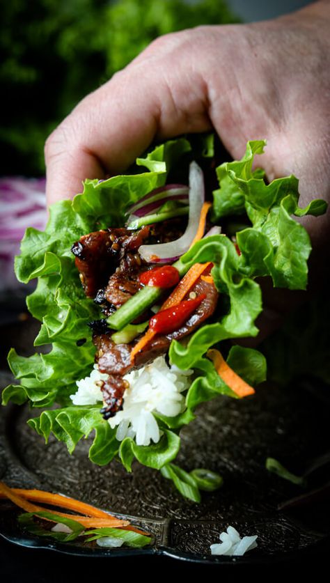 Beef Bulgogi Lettuce Wraps Recipe. Beef Bulgogi served with rice, cucumber, carrots, and onion wrapped up in lettuce. Bulgogi Lettuce Wraps, Korean Lettuce Wraps, Beef Bulgogi Recipe, Bulgogi Marinade, Korean Bulgogi, Lettuce Wraps Recipe, Steak Wraps, Bulgogi Recipe, Beef Wraps