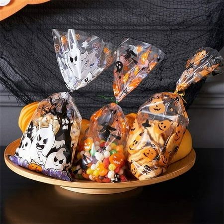 Value Sets:150 pcs cookie bags and 300 pcs ties are invluded in one set.Each bag measures 10.8 x 4.9 inch,great capacity for holding . Wide Application:Those bags are suitable for holding ,cookies,doughnuts,chocolates,popcorns,and small gifts;great for Halloween party decorations,favors and supplies. Premium Material:The bags are made of high quality oriented polypropylene (OPP) material,sturdy and for repeate use. The product includes 1 * 3pc ca[Collection] Halloween Paper Bags, Halloween Candy Box, Halloween Party Bags, Halloween Teacher Gifts, Halloween Gift Bags, Halloween Goodie Bags, Halloween Party Decorations, Halloween Candy Bags, Halloween Supplies