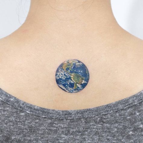 Blue earth tattoo on the upper back Tattoo Earth, Maori Tattoo Frau, Miniature Tattoos, Astronomy Tattoo, Globe Tattoos, Earth Tattoo, Upper Back Tattoos, Petit Tattoo, Planet Tattoos