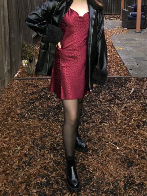 red satin dress, leather jacket outfit Red Dress Aesthetic Outfit, Red Dress With Black Jacket, Red Jacket Outfits For Women, Leather Jacket And Dress Aesthetic, Edgy Red Dress Outfit, Dress With A Leather Jacket Outfit, Jacket Over Dress Formal Satin, Silk Red Dress Outfit, Prom Dress With Leather Jacket