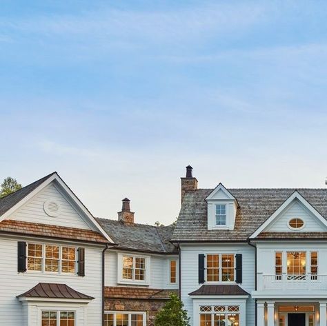 Purple Cherry Architects & Interior Design on Instagram: "HOME TOUR: Located on a tributary of the Chesapeake Bay, this Oxford, Maryland residence appears outwardly grand, but the home is just one room deep. Gently curving along the shoreline, the waterfront elevation features large windows and French doors that provide abundant natural light and striking waterfront views for every room.⁠ ⁠ Designed as a classic Maryland coastal country home, the structure appears to have gradually expanded with new additions over time. This narrative is accomplished with different roof forms and materials, successfully presenting the home as if the center block existed as the original structure on the property. The informal drive and parking court is encircled by the wings of the house. ⁠ ⁠ Architect: @pu Parking Court, Coastal Country, Exterior Ideas, Chesapeake Bay, Country Home, Home Tour, Large Windows, French Doors, House Tours