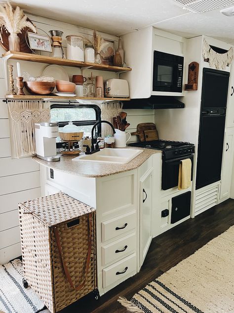 See how a family gave their renovated travel trailer homey, boho vibes #rvrenovation #glamping #traveltrailer #rvinterior #rvinspiration #rvingwithkids #homeonwheels #styleonwheels #rvremodel #rvhomebirth #rvfamily #rvbeforeandafter #wanderfulrvinteriors via @wanderfulrvinteriors Rvs Kitchen, Rv Kitchen Remodel, Rv Interior Remodel, Extra Space Storage, Camper Interior Design, Camper Trailer Remodel, Trailer Decor, Diy Camper Remodel, Rv Homes