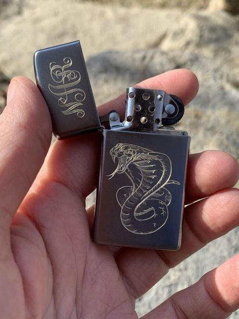 Hand engraved Zippo Lighter Custom Image Cobra Initial Monogram Name Personalized VIDEO. #axes #handmade Zippo Lighter Custom, Engraved Zippo, Custom Lighters, Environmentally Friendly Gifts, Cool Lighters, Pretty Knives, Lighter Fluid, Initial Monogram, Zippo Lighter