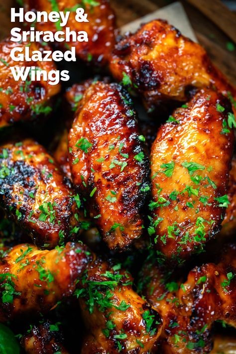 Honey and sriracha chicken wings with a yummy sweet & spicy glaze, with instructions for cooking in an Air Fryer, on the BBQ & in an oven. These delicious finger-licking wings take around 30 minutes to cook in an air fryer or on the BBQ, and around hour in the oven. Chicken Wings In The Air Fryer Oven, Wings Recipe Spicy, How To Cook Chicken Wings In Air Fryer, Chicken Wings On The Bbq, Spicy Honey Garlic Chicken Wings, Chicken Wings In Oven Recipes, Korean Wings Air Fryer, Honey Sriracha Wings, Asian Style Chicken Wings