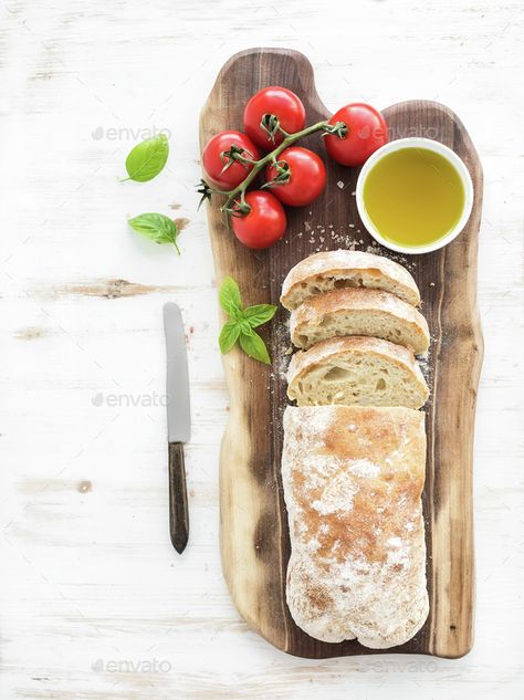 Bread With Tomato And Basil, Ciabatta Bread Photography, Bread Photography Food Photo, Tomato Basil Focaccia Bread, Kalamata Olive Bread, Olive Paste, Whole Grain Pancakes, Lamb Ribs, Grilled Lamb