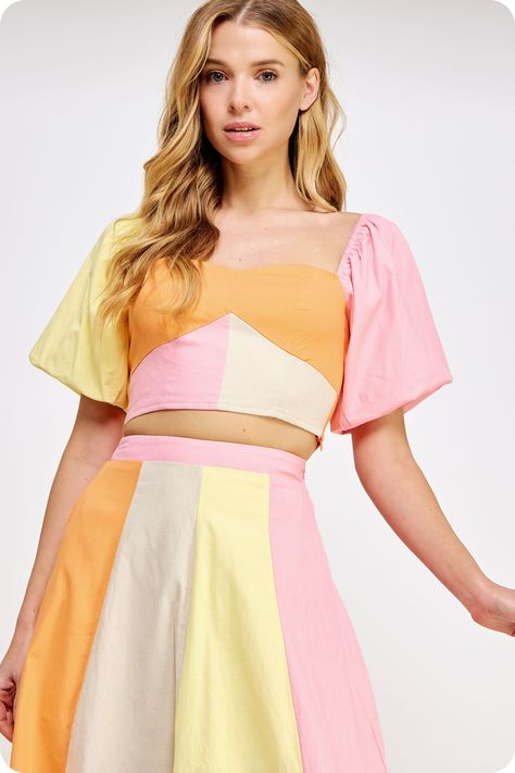 Color blocked puff short sleeve top in stretch cotton fabric This style features a sweetheart neckline, crop length, puff short sleeves with elasticated shoulder, elastic smocking at back, side zipper closure, and tie at back Matching Set with: Color Crush Skirt Midi Skirt Set, Color Block Skirt, Stretch Cotton Fabric, Color Crush, Plus Size Activewear, Clothes Collection, Tee Dress, Cropped Top, Short Sleeve Top