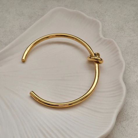 Our best selling Knot Bangle in gold, this one is a classic and will never go out of style Bangles And Bracelets, Stacking Bangles, Knot Bangle, Bangle Gold, Stacked Bangles, Gift For A Friend, Layered Jewelry, Trendy Jewelry, Dainty Jewelry