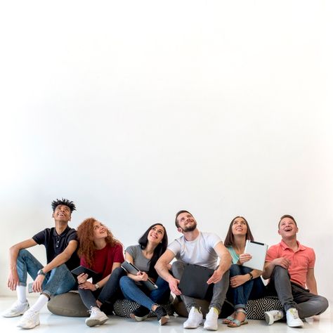 Multiethnic friends sitting on floor looking up against white backdrop Photo | Free Download Sitting On Floor, Group Photo Poses, Thriving Business, Business Photoshoot, People Poses, Best Photo Poses, People Sitting, Team Photos, White Backdrop