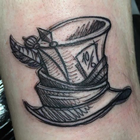 Marty Fletcher on Instagram: “Mad Hatter’s hat on @megannhyslop_ this afternoon! #madhatter #madhattertattoo #aliceinwonderland #aliceinwonderlandtattoo #disney…” Mad Hatters Hat Drawing, Mad Hatter Hat Tattoo Simple, Small Mad Hatter Tattoo, Mad Hatters Hat Tattoo, Mad Rabbit Tattoo, Mad Hatter Tattoo Alice In Wonderland, Alice In Wonderland Mad Hatter Tattoo, Top Hat Tattoo Design, Mad Hatter Hat Tattoo