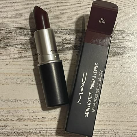 LONG-WEARING | NON-DRYING | DOE FOOT APPLICATOR Shade: Belladonna Be bold with a showstopping pout! This lightweight satin-matte lip color features a deluxe hydrating formula and provides extreme color payoff in one saturated swipe. Mac Media Lipstick, Storybook Cosmetics, Maquillage On Fleek, Fancy Makeup, Dark Makeup, Makeup Obsession, Make Up Inspo, Makeup Stuff, Makeup Items