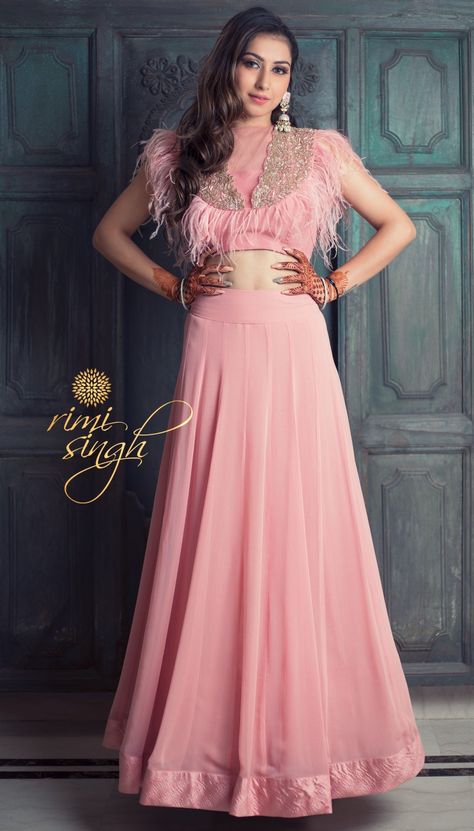 "ARSH" "The Sky" Festive Winter 2019  Picture Credits House Ocf  Flamingo pink georgette skirt paired with a matching crepe top with feathers and zardosi embroidery.  Available exclusively at  Rimi Singh Studio A 999 Sushant Lok 1  Gurgaon  #9818310054. Feather Blouse Designs, Blouse With Feathers, Top With Feathers, Zardosi Embroidery, Georgette Skirt, Haldi Outfit, Lilac Grey, Crepe Top, Designer Outfits