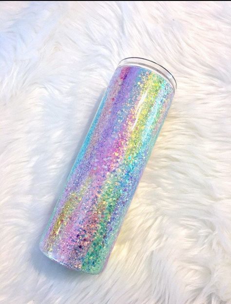 So many beautiful colors!  *May come with tinted lid These are stainless steel, double wall, vacuum insulated tumblers, that include sliding lids (20oz, 30oz Skinny) -- sure to keep your favorite drink hot or cold for HOURS, not to mention, they're fun to look at! A Rainbow of colors with Opal glitter covers this beautiful tumbler! These Tumblers are handmade with REAL glitter and layers of epoxy to ensure all glitter stays and for a glass like finish. Hand wash only.  Do Not use harsh abrasive Tumbler Quotes, Epoxy Tumbler, Glitter Tumbler Cups, Rainbow Opal, Dichroic Glass Pendant, Glitter Dipped, Rainbow Gift, Tumbler Cups Diy, Epoxy Resin Crafts