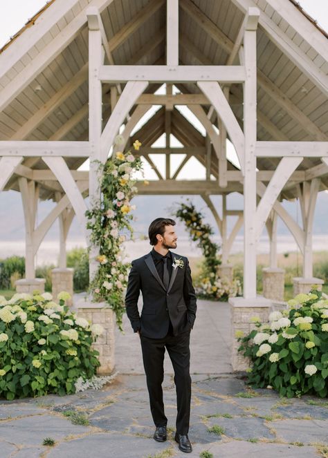 All Black Groom Suit With Bride, Husband And Groomsmen, All Black Groom Tuxedo, Solid Black Suit Groom, All Black Outfit Men Wedding, Groom Looks Classy, Black Suit Black Shirt Black Tie, Groom Outfit All Black, Beach Wedding Groom Attire Black