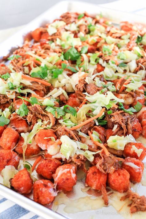 Totchos are tater tots served like nachos. These totchos are topped with bourbon bbq pulled pork, cheese and tangy slaw. The perfect weeknight dinner or party food. Pork Totchos, Beer Battered Chicken, Tangy Slaw, Light Foods, Pork Bbq, Tator Tots, Cooking A Roast, Football Snacks, Superbowl Party Food