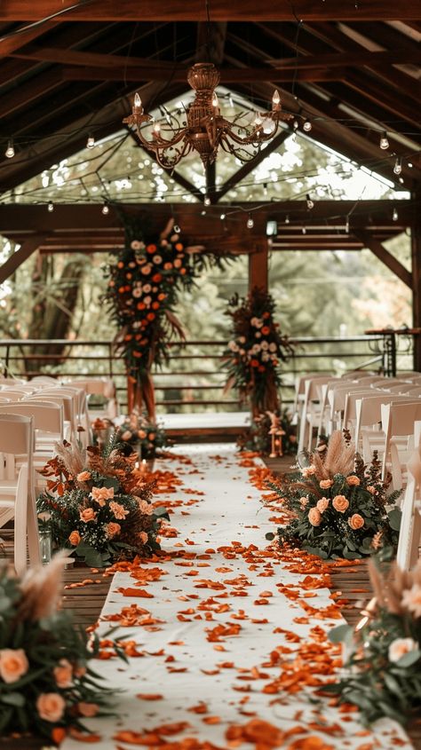 Planning a wedding is exciting but can also be a bit overwhelming. But if you're considering a fall wedding, you're in for a treat. There are many ways you can go about a fall wedding Fall Leaves Wedding Aisle, Outdoor Wedding Autumn, Rust Red Wedding Theme, Red Orange And White Wedding, Cute Fall Wedding Ideas, Outside Wedding Ideas Fall, Fall Wedding Indoor Ceremony, Rusty Orange Wedding Decor, Rustic Wedding Decor Fall