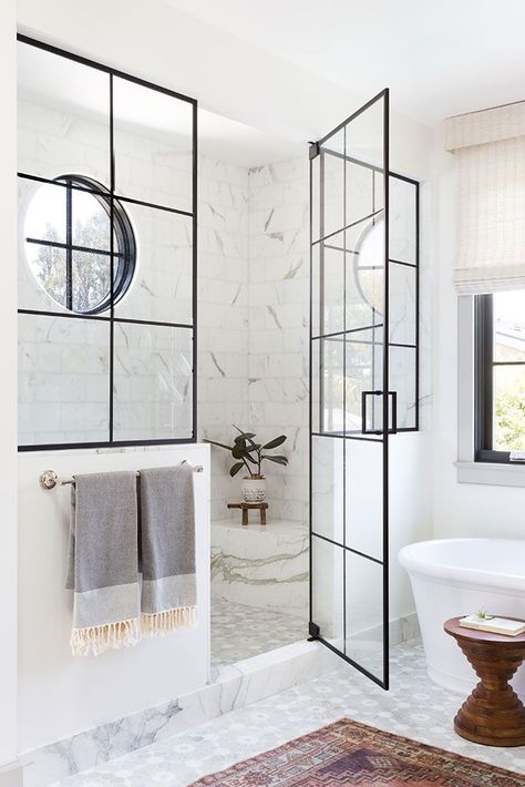 Such a beautiful bathroom! The shower enclosure, marble seating, and tile choices all work together to create a stunning space. bathroom decor - bathroom ideas - bathroom design - master bathroom - bathroom remodel Shower Windows Ideas, House Manifestation, Bathroom Moodboard, Bathrooms Design, Bathroom Details, Style Me Pretty Living, Window In Shower, Kitchen Cleaning, Shower Remodel