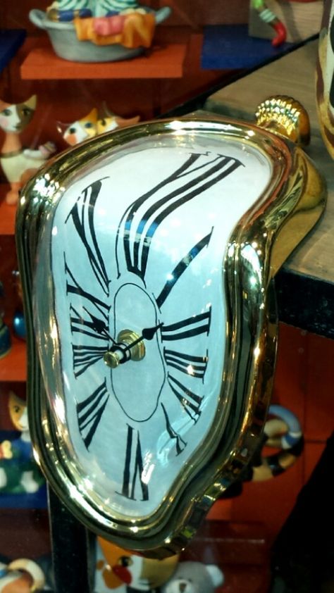 It looks like a melting clock,  I love it. Melting Clock Aesthetic, Melting Clock Decor, Clock Photoshoot, Clock In Bedroom, Salvador Dali Watch, Dali Watch, Melted Clock, Home Office Shelf, Melting Clocks