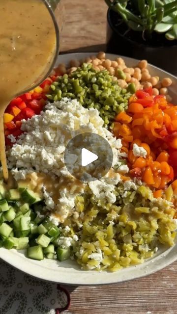 Mediteranean Ideas Everyday 🥗 on Instagram: "Greek Chickpea Salad for episode 2 of Spoon Salads! 🥄🥗

Cre by @crowded_kitchen

If you missed episode 1, this series is all about chopped salads that you can eat with a spoon, which IMO are the BEST kind of salads. 
GREEK CHICKPEA SALAD: 
Salad: 
1 15 oz can chickpeas (garbanzo beans), drained and rinsed 
1 ½ cups diced cucumber 
1 ½ cups diced bell pepper 
1 cup halved cherry tomatoes 
½ cup pitted olives, roughly chopped (kalamata, castelvetrano, etc) 
Optional: 
1/3 cup chopped pepperoncini peppers 
½ cup crumbled feta cheese (regular or vegan) 
Vinaigrette: 
1/2 cup olive oil 
3 tbsp red wine vinegar Juice from ½ of a lemon (~1 tbsp) 1 tsp dijon mustard 
½ tsp garlic powder 
½ tsp dried oregano 
¼ tsp salt 
¼ tsp black pepper 

#greeksal Greek Chickpea Salad, Vegan Greek, Greek Chickpeas, Pepperoncini Peppers, Chopped Salad Recipes, Chickpea Salad Recipes, Mediterranean Diet Plan, Superfood Salad, Kinds Of Salad