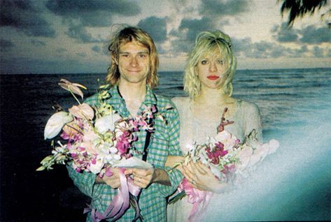 If you thought the icons of grunge would get married in something conventional, you thought wrong. Is there a wedding look more befitting the king and queen of Gen X slackerdom than pajamas and a vintage costume? Courtney Love Kurt Cobain, Kurt And Courtney, Frances Bean Cobain, Donald Cobain, Pattie Boyd, Nirvana Kurt Cobain, Iconic Weddings, Celebrity Wedding Dresses, Elvis And Priscilla