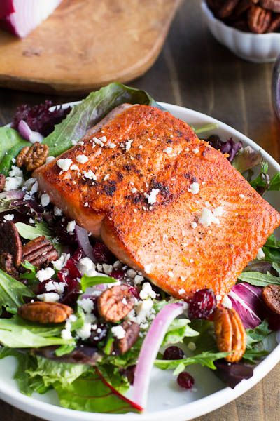 Seared Salmon with Mixed Greens over Dried Cranberries, Feta, and Candied Pecans Garlic Butter Salmon In Foil, Mixed Greens Recipe, Lemon Garlic Butter Salmon, Salmon In Foil, Garlic Butter Salmon, Butter Salmon, Salmon Seasoning, Seared Salmon, Salmon Salad