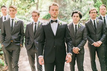 Photo from Sierra + Peter collection by Elate Photo Classic Black and White groom Grey suit groomsmen Black Tux With Grey Groomsmen, Groomsmen Attire Grey Charcoal, Charcoal Groomsmen, Grey Groomsmen Attire Suspenders, Groom Black Groomsmen Grey, Black Bridesmaids Grey Groomsmen, Casual Groomsmen, Gray Groomsmen Suits, Groomsmen Tuxedos