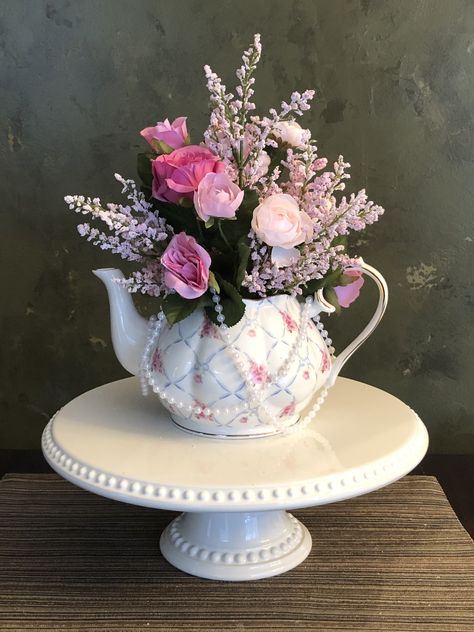 80th Tea Party Birthday, Flower Arrangement In Tea Pot, Goblet Vase Flower Arrangements, Flowers In Teapots Centerpiece, Teapot Floral Centerpieces, Tea Party Table Centerpieces, Tea Party Baby Shower Centerpieces, Tea Pot Centerpieces Table Decorations, Teapot Decorating Ideas