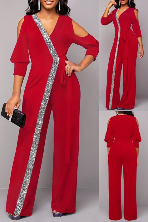 Turn heads with this stunning wine red jumpsuit. Featuring a chic cold shoulder design and stylish metal ring details, this piece is perfect for any occasion. The flattering V-neck and elegant silhouette make it a must-have for your wardrobe. Pair it with your favorite accessories and heels for a show-stopping look! ✨ #Fashionista #OOTD #StyleInspo #ChicFashion #JumpsuitLove #FashionTrends #WardrobeEssentials #ElegantStyle #FashionGoals #TrendyOutfits Bride Trousers, Red Suits For Women, Ministry Apparel, George Straight, Formal Romper, 82nd Birthday, Fashion Jumpsuits, V Neck Jumpsuit, Cold Shoulder Jumpsuit