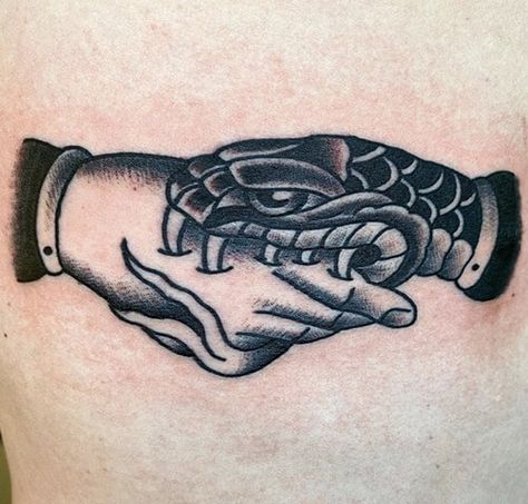 15+ Handshake Tattoo Designs: The Hand That Bites Tattoo | PetPress Snake Bite Tattoo, Handshake Tattoo, Bite Tattoo, Snake Bite, Hand Tattoo, A Tattoo, Tattoo Designs