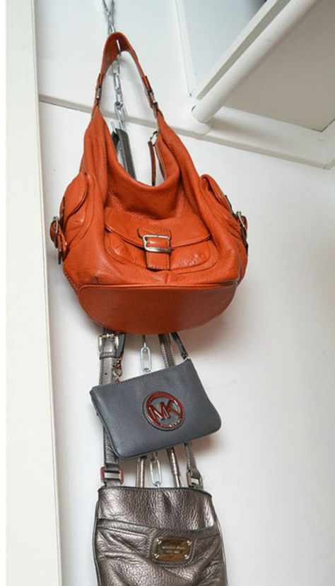 Hang a chain of s-hooks (you can get nab them at the local hardware store) from a hook on the wall—or from a bar in your closet—to keep bags organized. Layer your favorites in front so they're easily accessible. Get the tutorial here. - Redbook.com Diy Purse Organizer, Hanging Purses, Zimmer Diy, Stand Feria, Apartment Hacks, Closet Hacks Organizing, Organisation Hacks, Organizing Hacks, Bag Hook