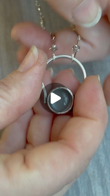 Eryn Rosenbaum on Instagram: "Just finished another kinetic piece. The idea for this started as @oharastudios‘s swiveling tube pendant, one of her excellent class projects, and I adapted it so that the necklace could be repurposed as a ring. Or vice versa— if you’re working with your hands and a ring would get in the way, wear it around your neck until you’re done. I think it’s fun when jewelry gives you options! 

Gray/white moonstone. Size 9.5, available in my next update. 

#kineticjewelry #cleverjewelry #cooljewelrydesign #coolsilver #cooljewelry #oneofakindgifts" Kinetic Jewelry, The Necklace, White Moonstone, Class Projects, Instagram Update, Jewelry Ideas, Gray White, Moonstone, Things To Think About